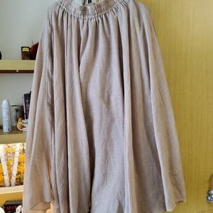 Light and flowy skirt. Light tan color